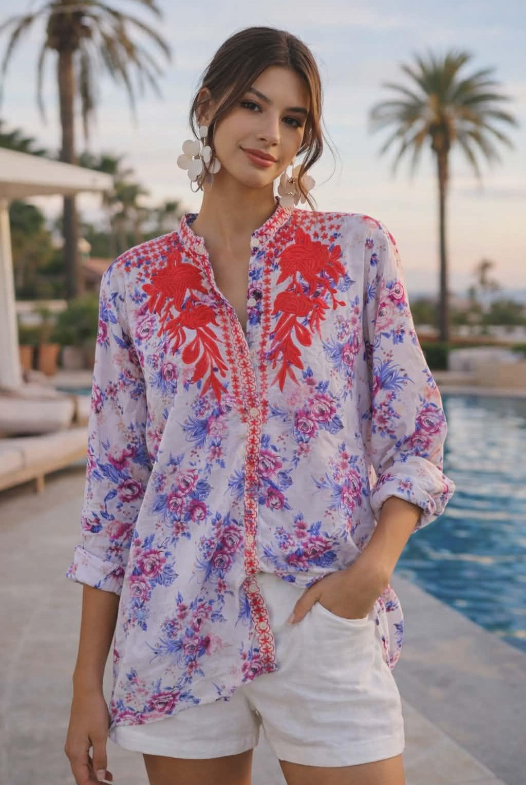 The Nu Vintage lightweight cotton floral blouse with red embroidered neckline detail styled for a chic resort vacation look.