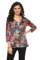 Close-up of colorful abstract art pattern on V-neck blouse
