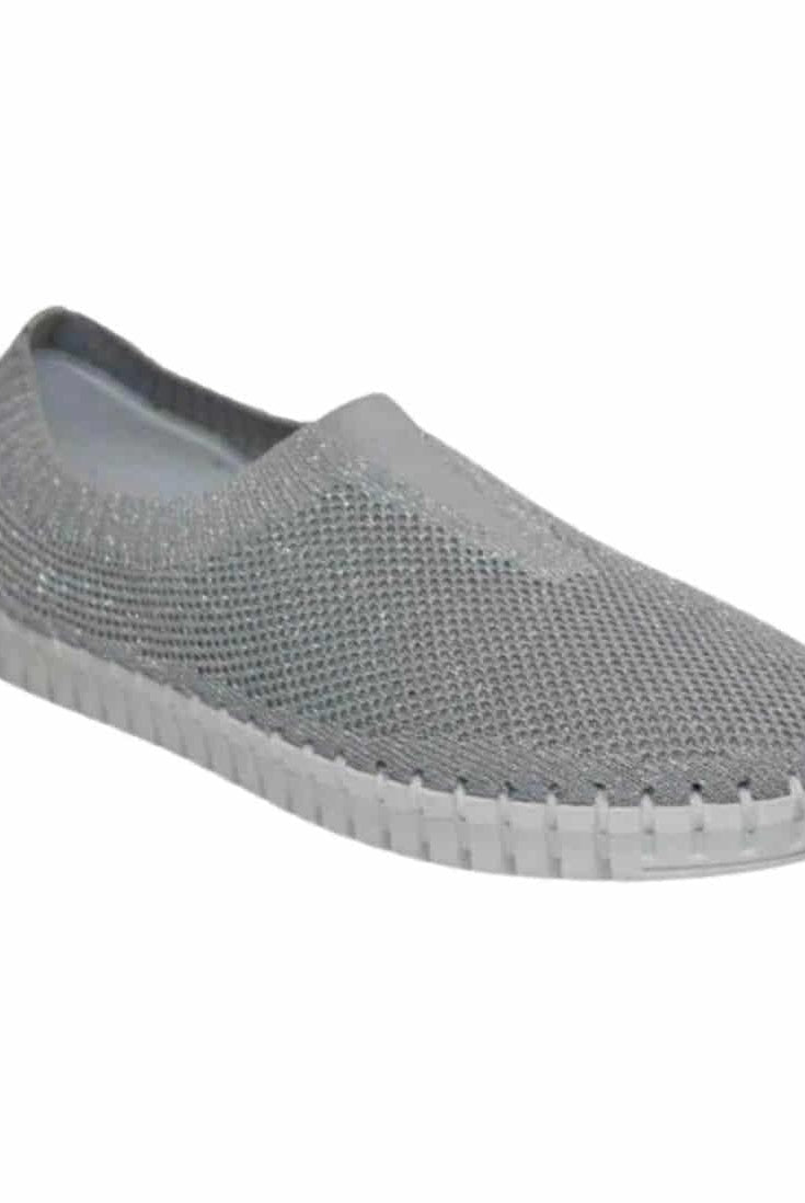 Gray slip-on shoe on a white background