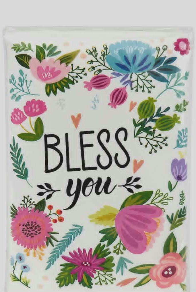 Small floral pocket tissue pack with colorful flowers and "Bless You" text, perfect for purses, travel, and gift giving.