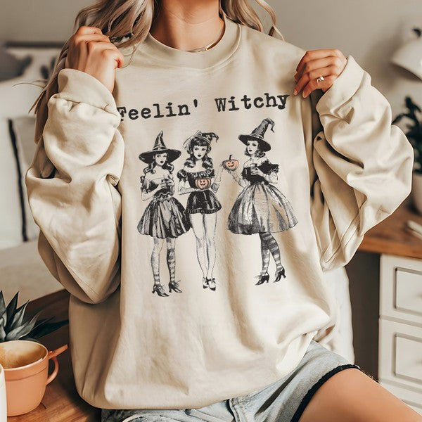 Cream Feelin’ Witchy sweatshirt styled with shorts, fall outfit