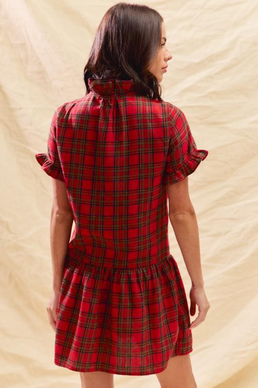 Red plaid drop-waist dress styled for festive occasions, back view