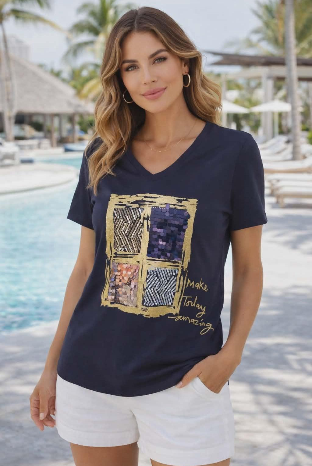 Michael Tyler navy V-neck tee with sequin square graphic and “Make Today Amazing” gold script on a resort-chic model