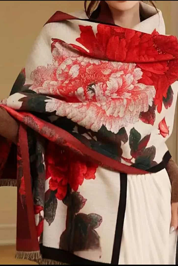 “Model wearing red and white floral jacquard shawl elegantly draped”