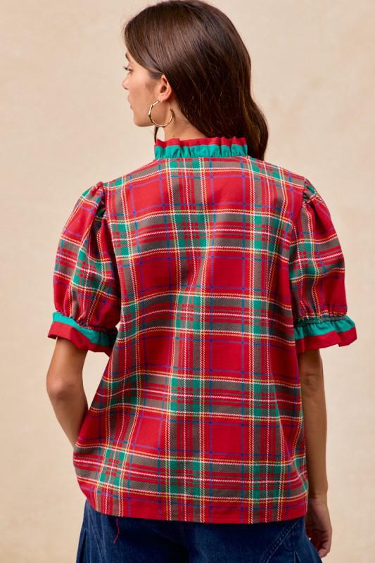 Back View Woman wearing red plaid blouse with green trim and ruffled puff sleeves – festive holiday top by Petunias of Naples