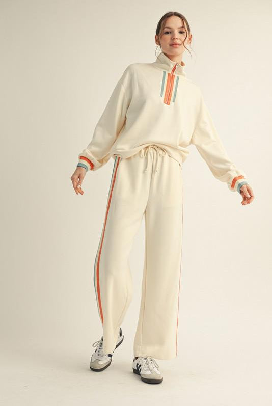Women’s contrast stripe knit lounge set with half-zip top and wide-leg pants