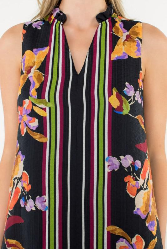 Close-up of floral print and striped detailing on sleeveless dress
