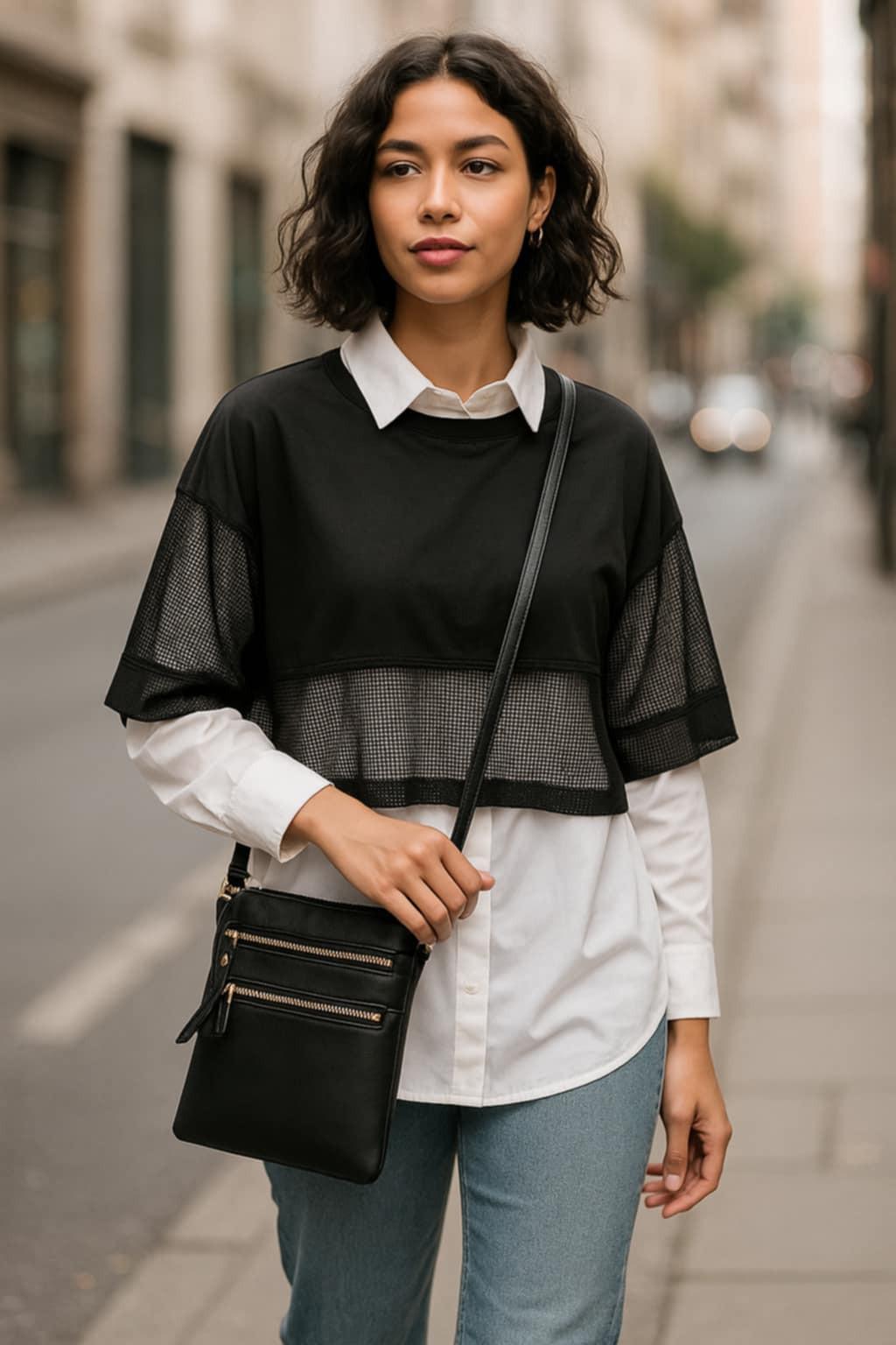 “Black vegan leather purse with gold hardware and interchangeable straps”