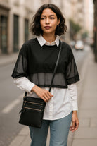 “Black vegan leather purse with gold hardware and interchangeable straps”