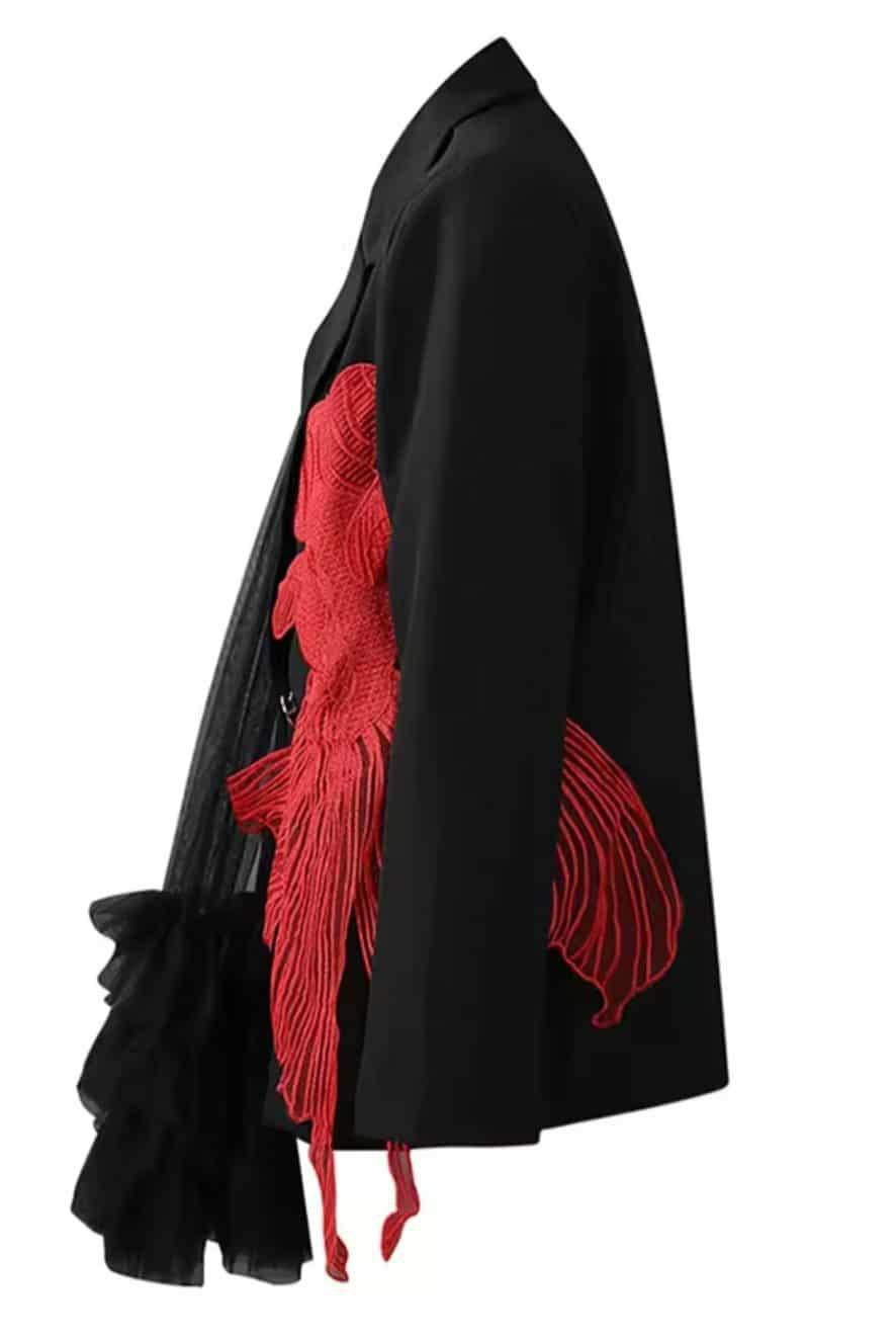 Black blazer with red embroidered koi fish and cascading tulle detail, styled with silver buttons – urban chic women’s statement jacket, side view