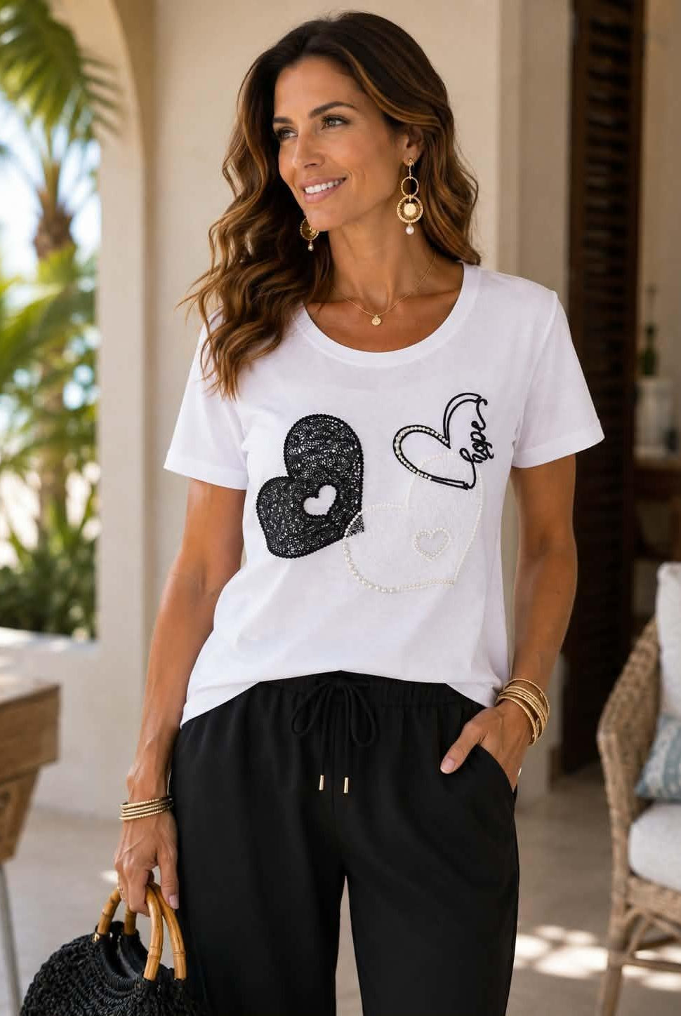 Picadilly white short sleeve tee with black and white textured heart design, pearl details and sparkling crystal embellishments.