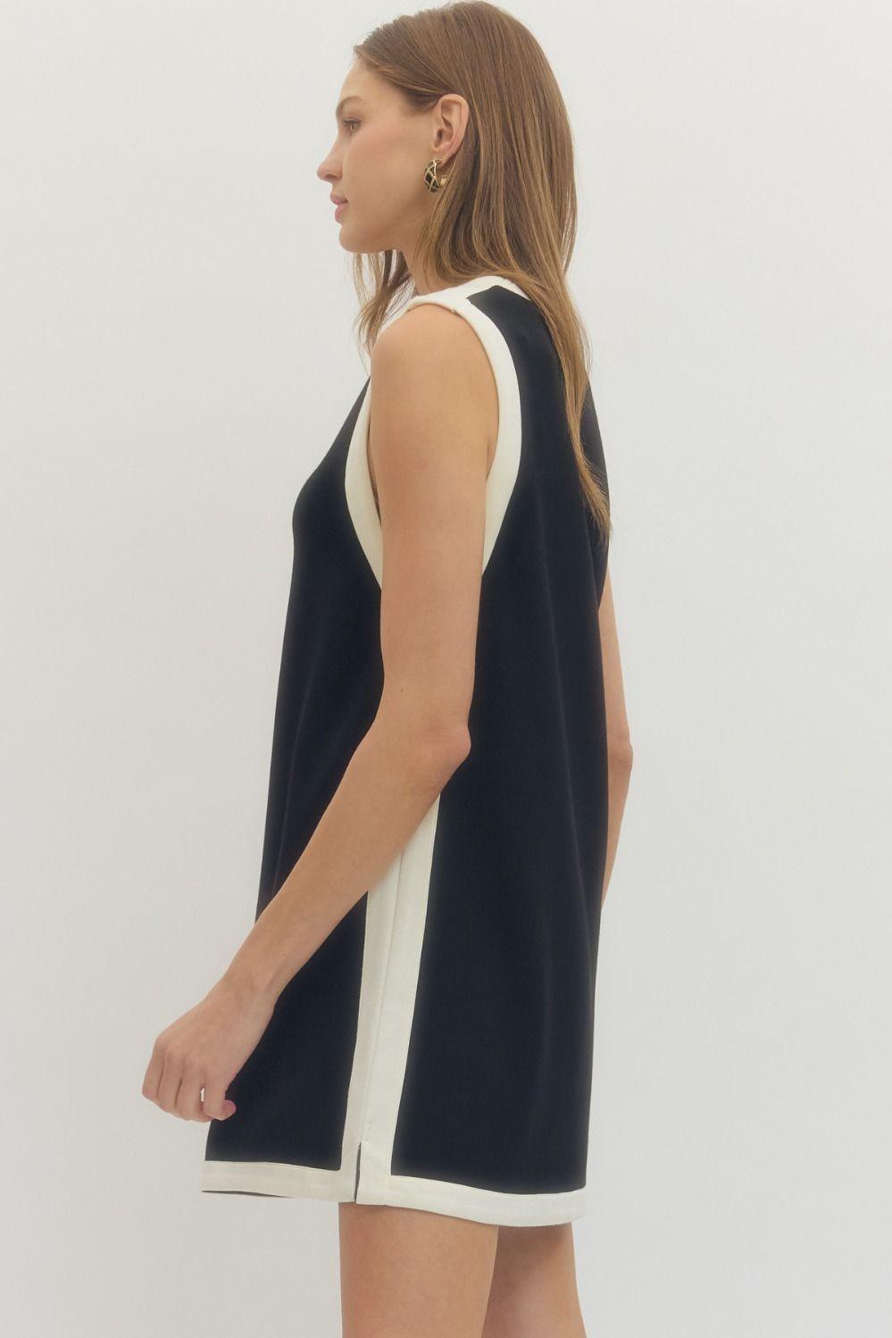 Entro knit black shift dress with white contrast trim and V-neckline side view