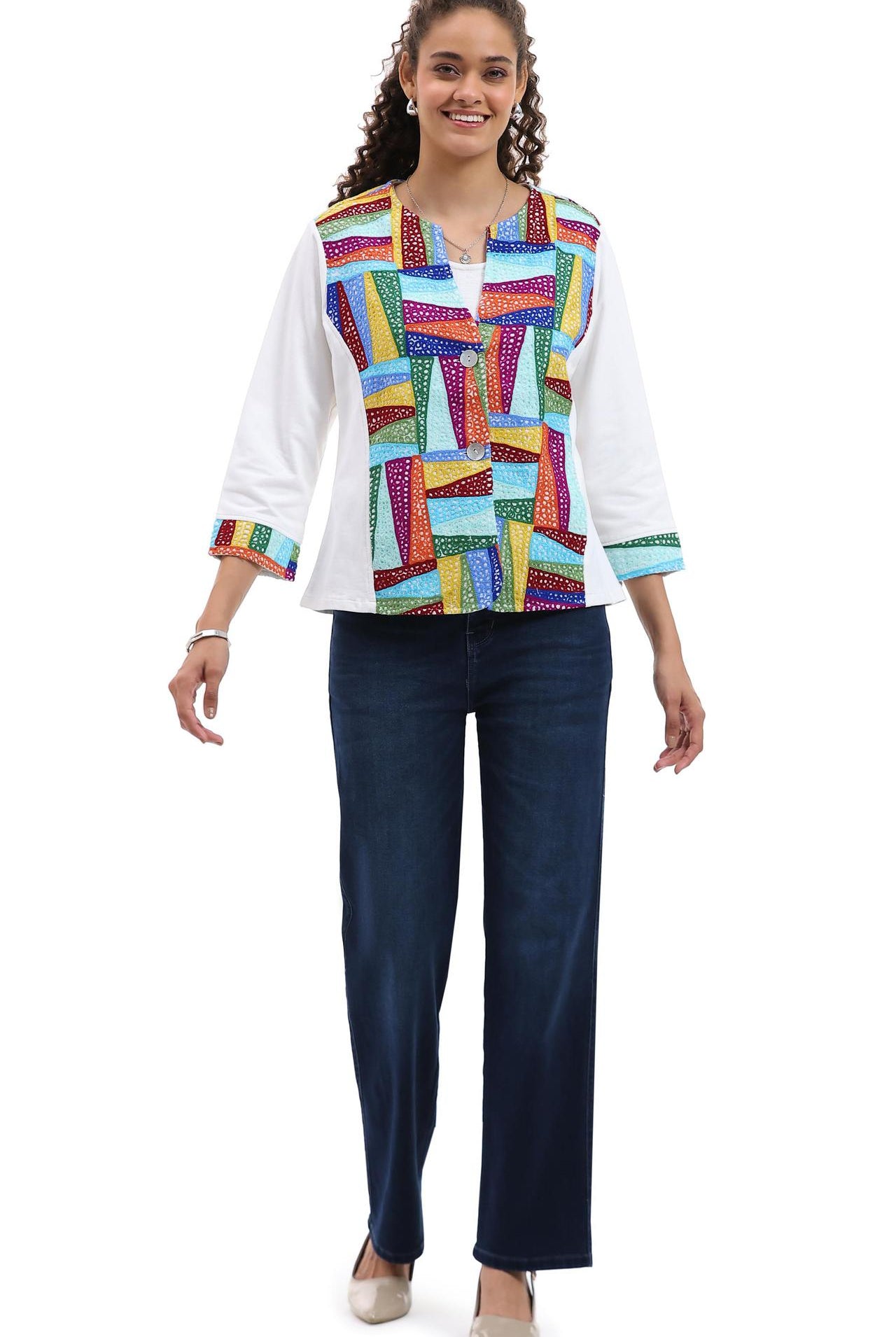 Multicolor Parsley & Sage knit jacket layered over white top and jeans