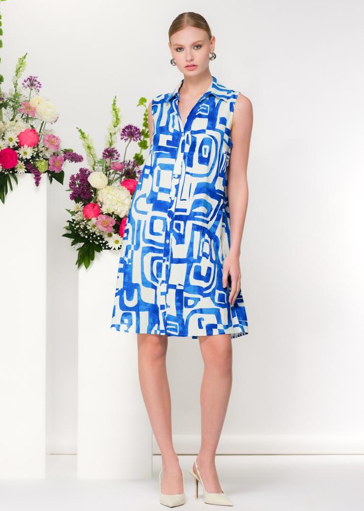 Model wearing Elena Wang blue and white abstract linen blend sleeveless shirt dress with button front