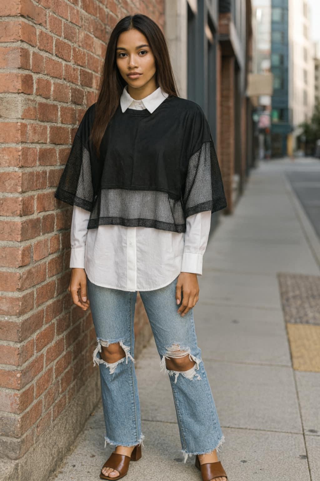 “Urban chic layered top with mesh sleeves and collared shirt by Michael Tyler”