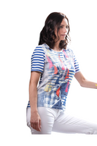 Women's Alison Sheri top featuring a colorful sailboat print, crystal embellishments, striped knit sleeves, striped knit back, and lightweight crepe front.