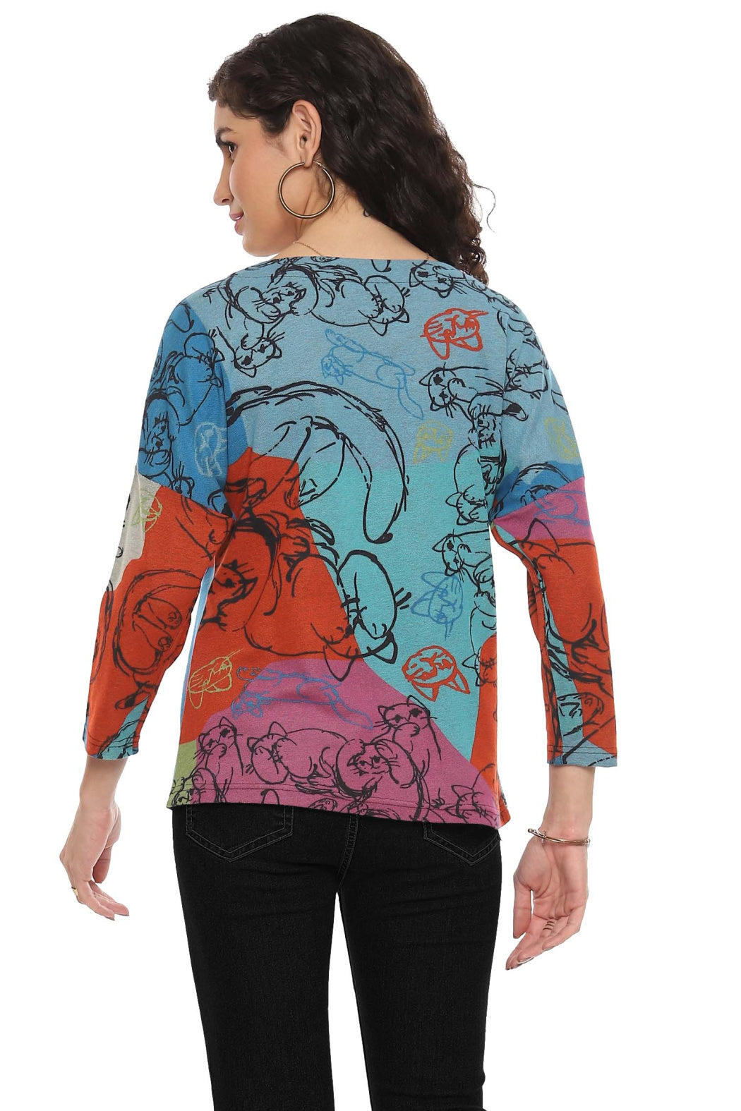 Parsley & Sage 3/4 sleeve knit top with colorful geometric blocks and whimsical cat illustrations in a relaxed pullover style.