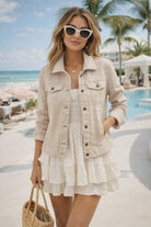 The Nu Vintage linen cotton blend jacket with “Be Yourself” bird artwork on the back shown in resort chic styling