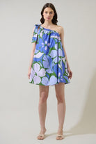 Sugar Lips blue floral one-shoulder summer dress with tie strap and breezy resort style silhouette