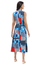 Woman wearing a colorful geometric patterned dress on a white background, Pa, back viewrsley & Sage sleeveless abstract knit dress with pockets for women