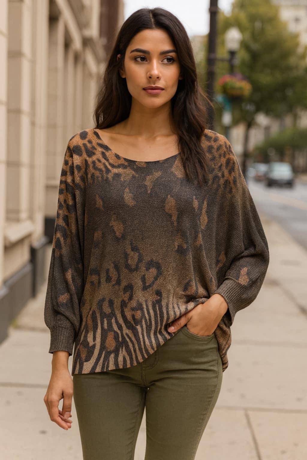 Beautiful urban chic woman wearing a Made in Italy dolman sleeve animal print sweater with khaki green pants.