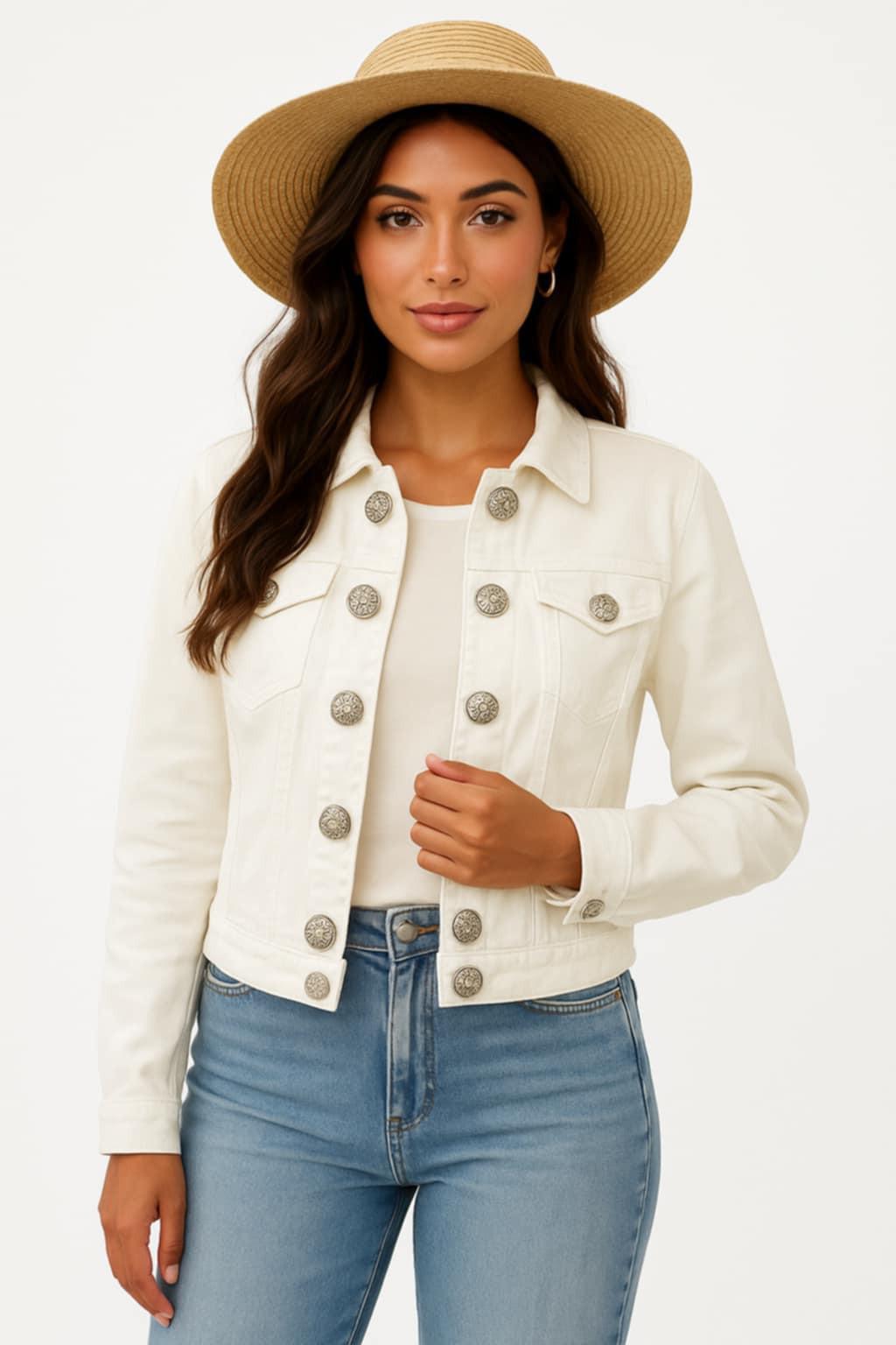 . Orly white denim jacket with bold silver statement buttons, styled with light wash jeans.