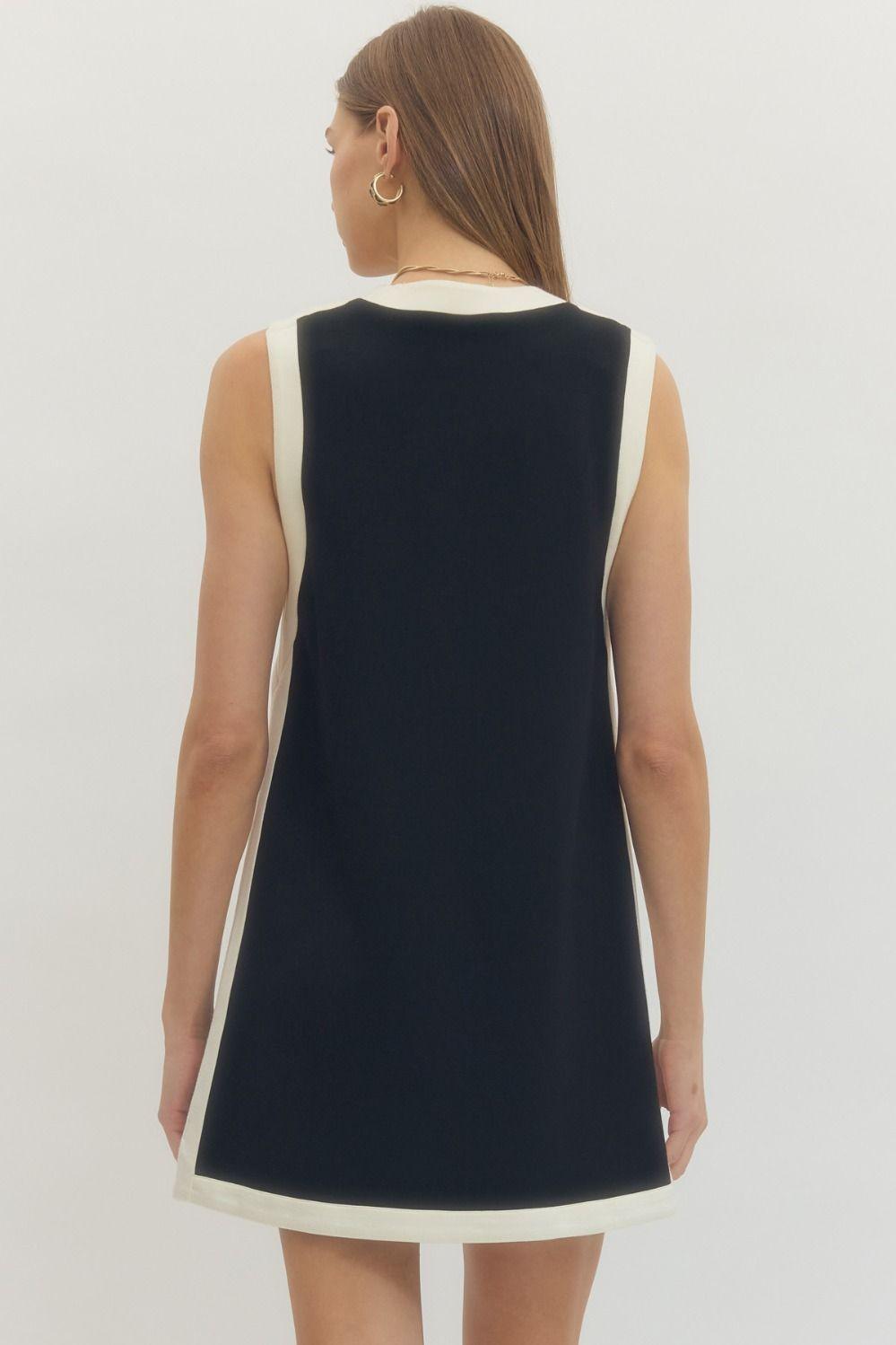 Entro knit black shift dress with white contrast trim and V-neckline, back view