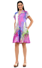 Woman wearing a colorful dress on a white background