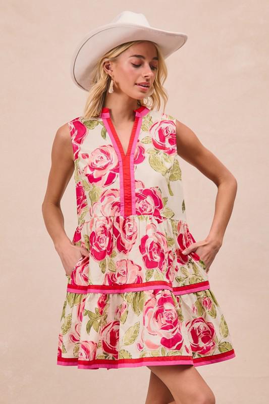 “Sleeveless floral tiered dress with pink rose print and pocket