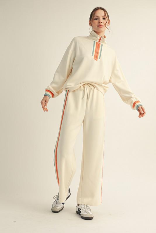 Women’s contrast stripe knit lounge set with half-zip top and wide-leg pants