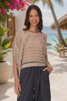 Gabby Isabella beige fringe knit sweater front view
Boho chic fringe sweater with open knit detail