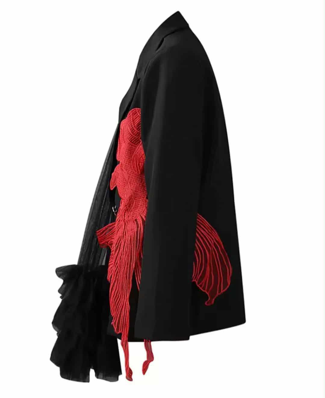 Black blazer with red embroidered koi fish and cascading tulle detail, styled with silver buttons – urban chic women’s statement jacket, side view