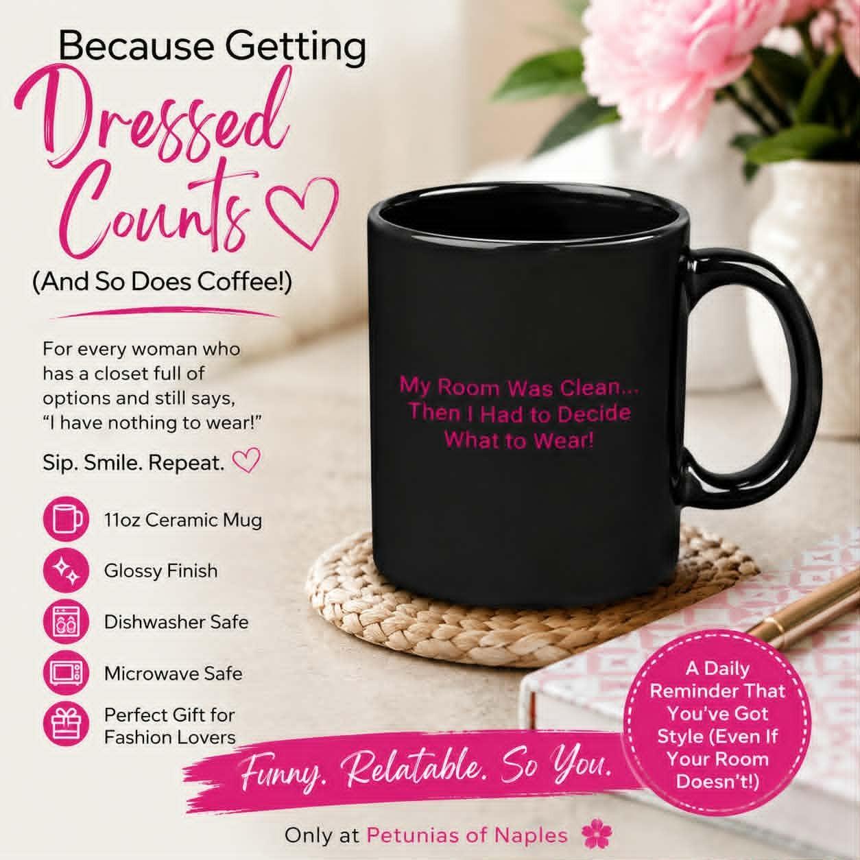 Black ceramic coffee mug with pink lettering reading, "My Room Was Clean... Then I Had to Decide What to Wear!"