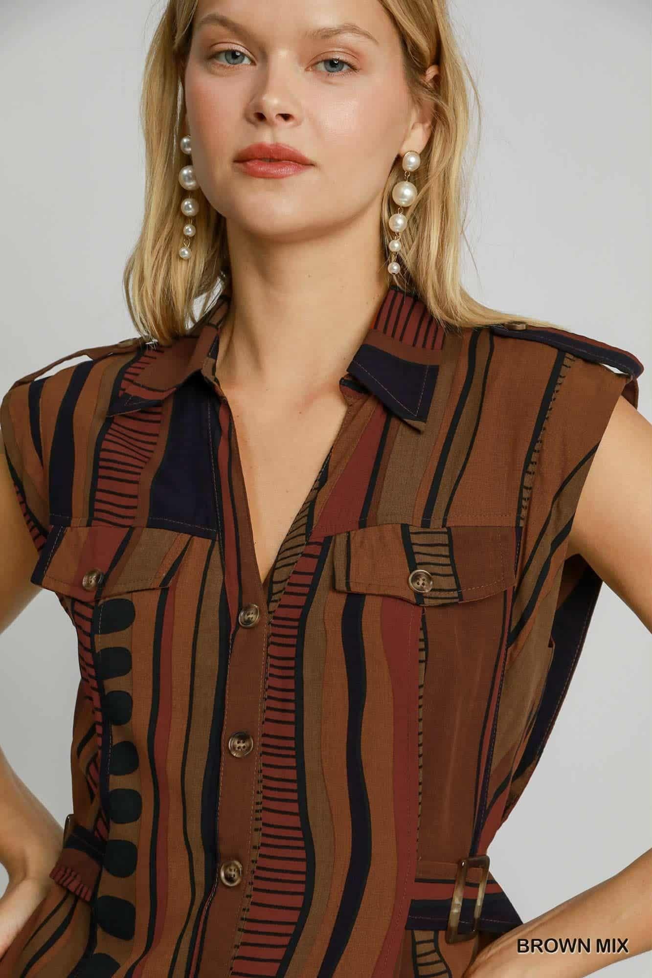 Close-up of collar and vertical stripe pattern on brown mix dress.