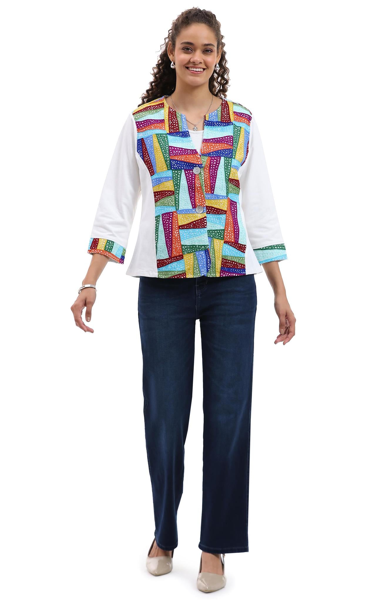Multicolor Parsley & Sage knit jacket layered over white top and jeans