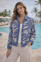 Michael Tyler blue leaf mesh jacket with button front and chambray trim styled on a resort-chic model