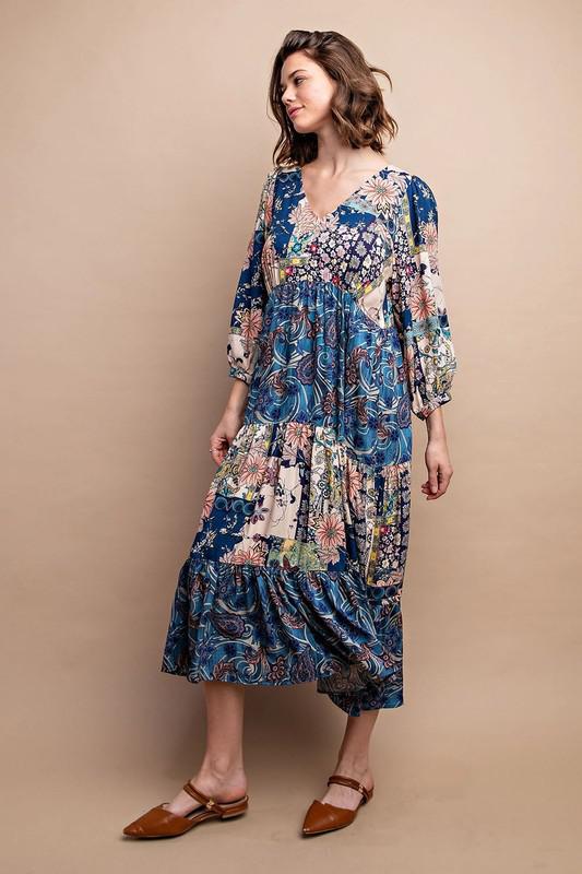Patchwork floral dress with tiered skirt and bell sleeves