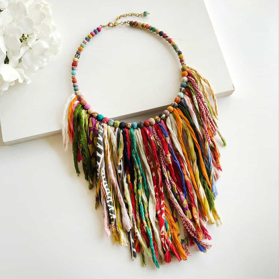 “WorldFinds Kantha Fringe Necklace handmade from recycled textiles – colorful fair-trade boho statement jewelry”