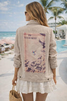 The Nu Vintage linen cotton blend jacket with “Be Yourself” bird artwork on the back shown in resort chic styling